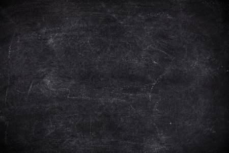 Chalk rubbed out on blackboard for background. picture for add text or education background.の写真素材