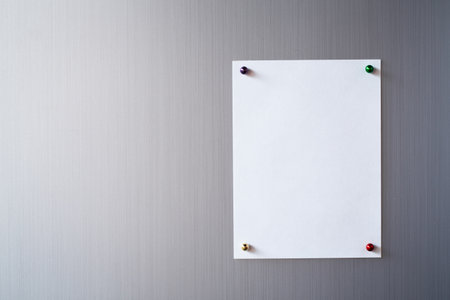 Abstract Empty paper sheet on metal surface. Magnetic clip on paper note for add text.の写真素材
