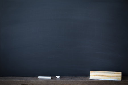 Abstract Chalk rubbed out on blackboard or chalkboard texture. clean school board for background or copy space for add text message. Backdrop of Education concepts.の写真素材