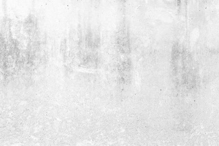 Abstract grungy white concrete seamless background. Stone texture for painting on ceramic tile wallpaper. Cement backdrop for design art work and pattern.の写真素材