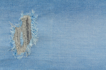 Retro color tone of blue denim jeans fabric texture for background website fashion design or backdrop product.の写真素材
