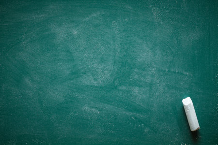 Green Chalkboard. Chalk texture school board display for background. chalk traces erased with copy space for add text or graphic design. Education conceptsの写真素材
