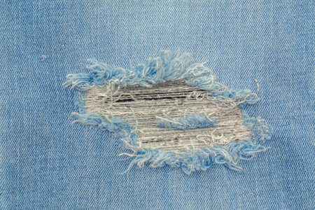 Retro color tone of blue denim jeans fabric texture for background website fashion design or backdrop product.の写真素材