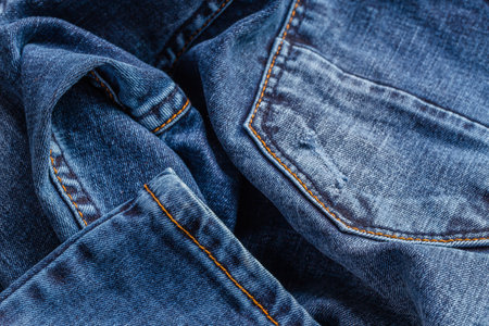 Retro color tone of blue denim jeans fabric texture for background website fashion design or backdrop product.の写真素材
