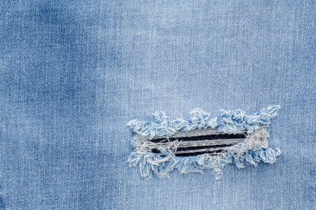 Retro color tone of blue denim jeans fabric texture for background website fashion design or backdrop product.の写真素材