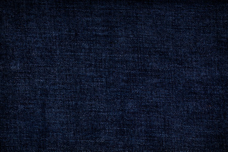 Retro color tone of blue denim jeans fabric texture for background website fashion design or backdrop product.の写真素材