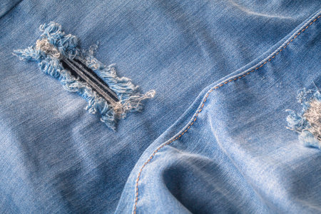 Retro color tone of blue denim jeans fabric texture for background website fashion design or...
