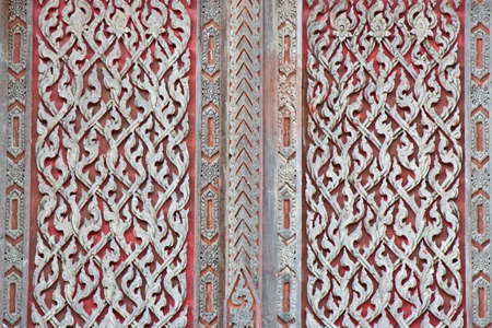 carved wooden window panel in wat That