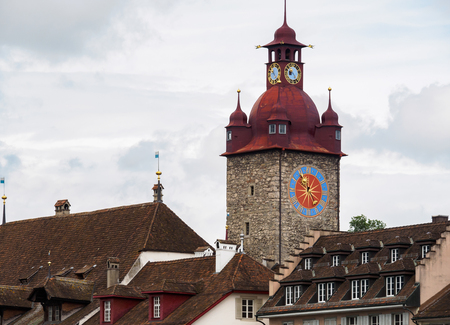 The famous red clock tower in Luzern city, Luzern, Switzerland.のeditorial素材