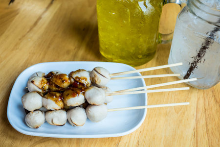 Grilled meat ball with spicy sauceの写真素材