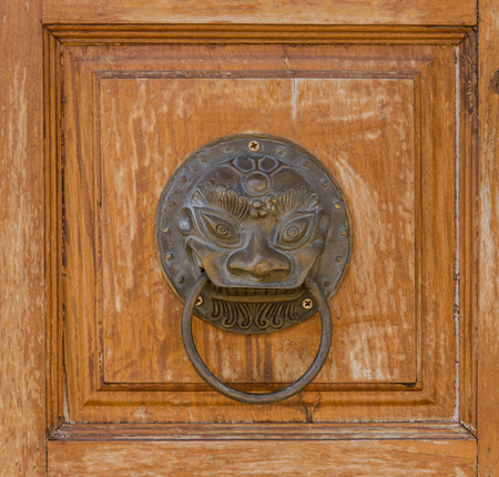 Door handle in wood