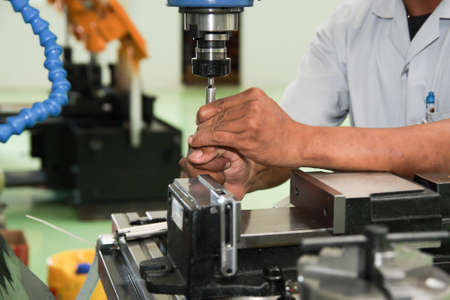 A man is working in manufacturingのeditorial素材