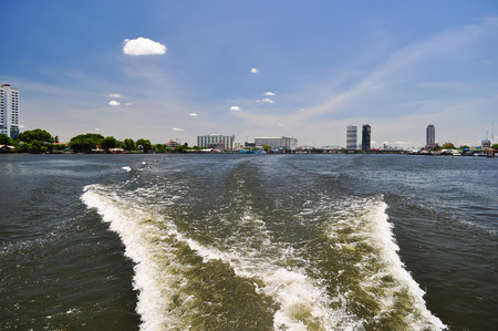 Bangkok Thailand. Transport boat as cheap and essential choice in everyday life of Thais near Chaopraya riverの写真素材