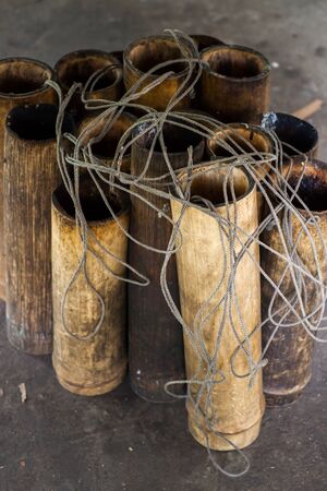 Toddy palm prepared in bamboo for sugar boiling process.