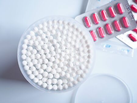 Equipment for maintaining health when sick with cotton wool, medicine and painkiller tablets
