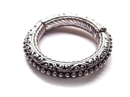 Thai ladies bracelet, traditional silver jewelry isolated on white background.の写真素材