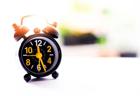 Vintage black alarm clock with copy space
