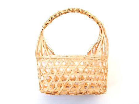 Wicker bamboo weave basket handbag thai style isolated on white background.の写真素材