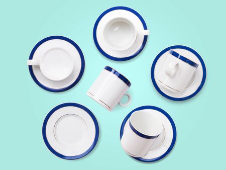Top view of coffee mug set or tea cup on round saucer plate
