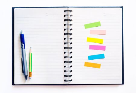 Notebook with pen and sticky note paper set. Isolated on white background.の写真素材