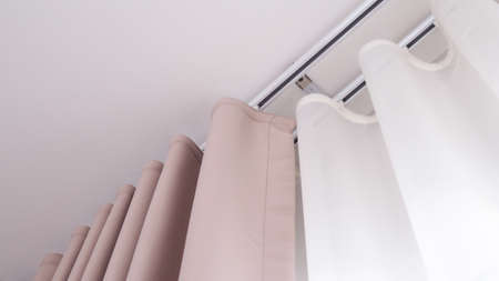 Brown curtains and white sheer curtains decorate elegant homes.の写真素材