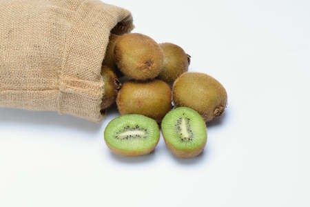 kiwi friut in sack on white background.の写真素材
