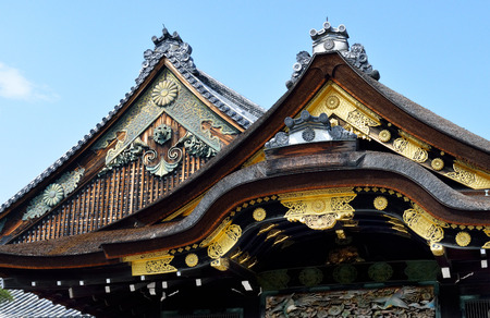 A closeup of the roof of Ninomaru Palace, Nijo Castle, Kyoto, Japan, showing its gold decorative features.のeditorial素材