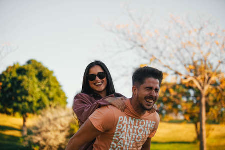portrait of a group of friends in the field. Group of friends happy and laughingの写真素材