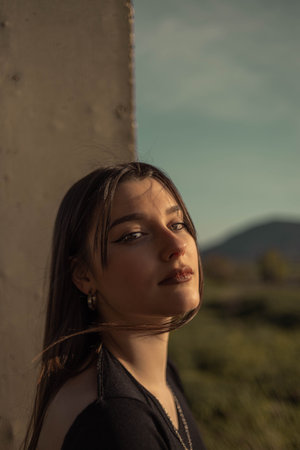 Portrait young woman on the street. Blue-eyed woman. Youth fashion. Urban style. Woman in a building under constructionの写真素材