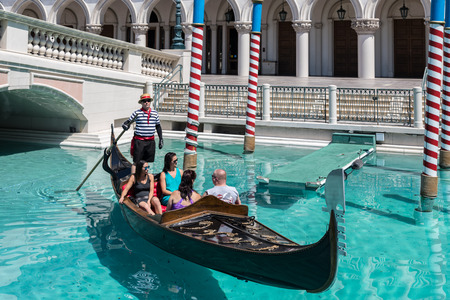 Las Vegas, Nevada, USA - September 1, 2017: Tourists enjoying ride in gondola at Grand Canal at The Venetian Resort Hotel and Casino.  This luxury hotel opened on May 3, 1999 on the Las Vegas strip.のeditorial素材