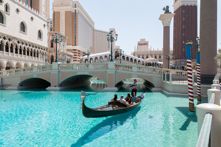 Las Vegas, Nevada, USA - September 1, 2017: Tourists enjoying ride in gondola at Grand Canal by the bridge at The Venetian Resort Hotel and Casino.  This luxury hotel opened on May 3, 1999 on the Las Vegas strip.のeditorial素材