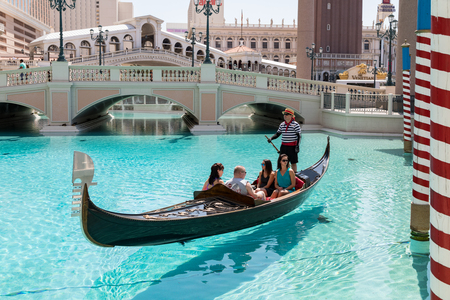 Las Vegas, Nevada, USA - September 1, 2017: Tourists enjoying ride in gondola at Grand Canal at The Venetian Resort Hotel and Casino.  This luxury hotel opened on May 3, 1999 on the Las Vegas strip.のeditorial素材