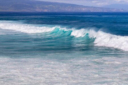 Waves breaking on Maui's north shore on the Hawaiian Islandの写真素材