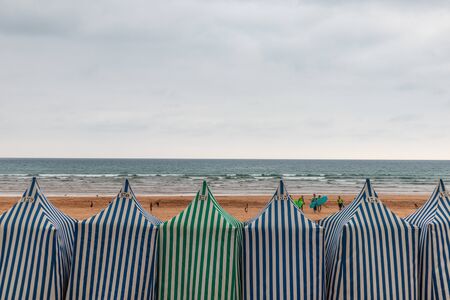 Vestries with stripes in Zarautz beachの写真素材