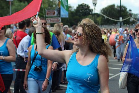 Bedford, England - July 21 - A majorette marches in the carnival at the bi-annual Bedford River Festival, England on 21 July 2012のeditorial素材