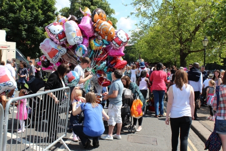Bedford, England - July 21 - A balloon seller walks around the streets during the bi-annual Bedford River Festival in England on 21 July 2012のeditorial素材