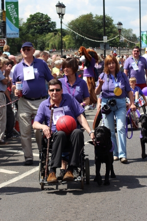 Bedford, England - July 21 - The Canine Partners charity promote the Paralympics in the carnival at the bi-annual Bedford River Festival in England on 21 July 2012のeditorial素材