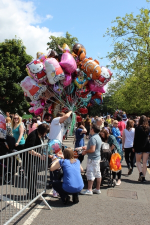 Bedford, England - July 21 - A balloon seller walks around the streets during the bi-annual Bedford River Festival in England on 21 July 2012のeditorial素材