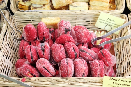 Delicious filled cake biscuits on a market stallの写真素材