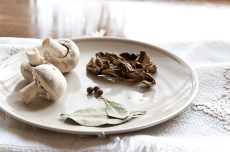 Mushrooms with spices on a plate の写真素材