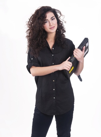 Positive young lady with a laptopの写真素材