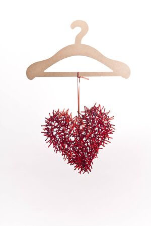 Creative Red heart on a hanger の写真素材