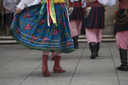 Polish folk dance group with traditional costumeの写真素材