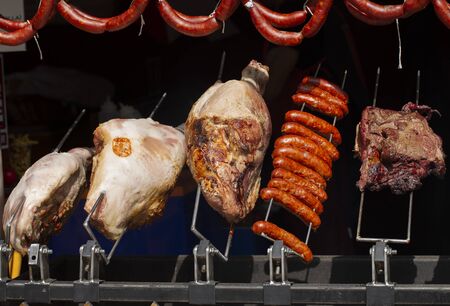 Meat on a rotisserie grillの写真素材