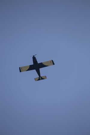 Below view of a plane in an air showの写真素材