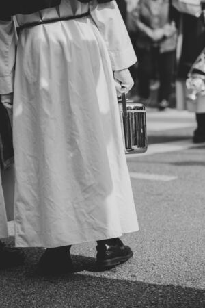 Below view of a hooded person in a procession, Holy Weekの写真素材