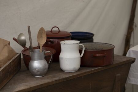 Vintage enameled pan and cutleryの写真素材