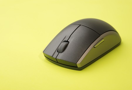 computer mouse with a colrfull yelow backgroundの写真素材