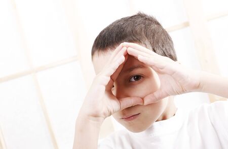a choldren loking at the cameraの写真素材