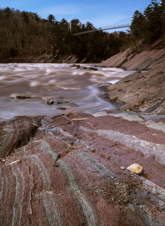hdr shot of a natural park in quebec,canada. Slow shutter speed. Focus on the groundの写真素材